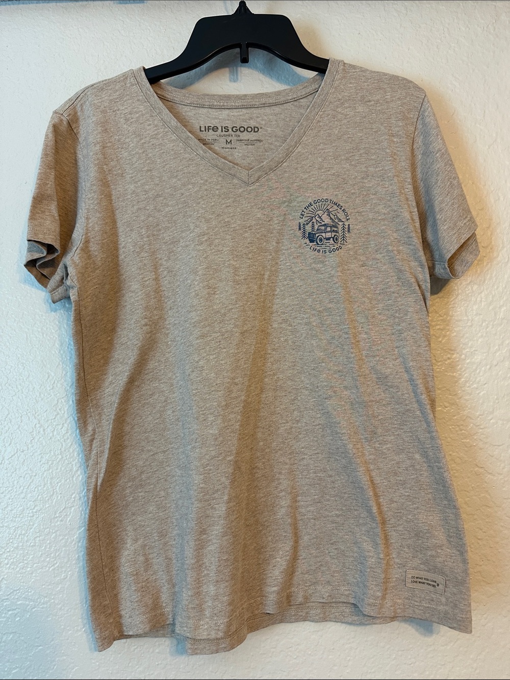Life Is Good women’s V-Neck Tee in tan color with Small Navy Chest Graphic